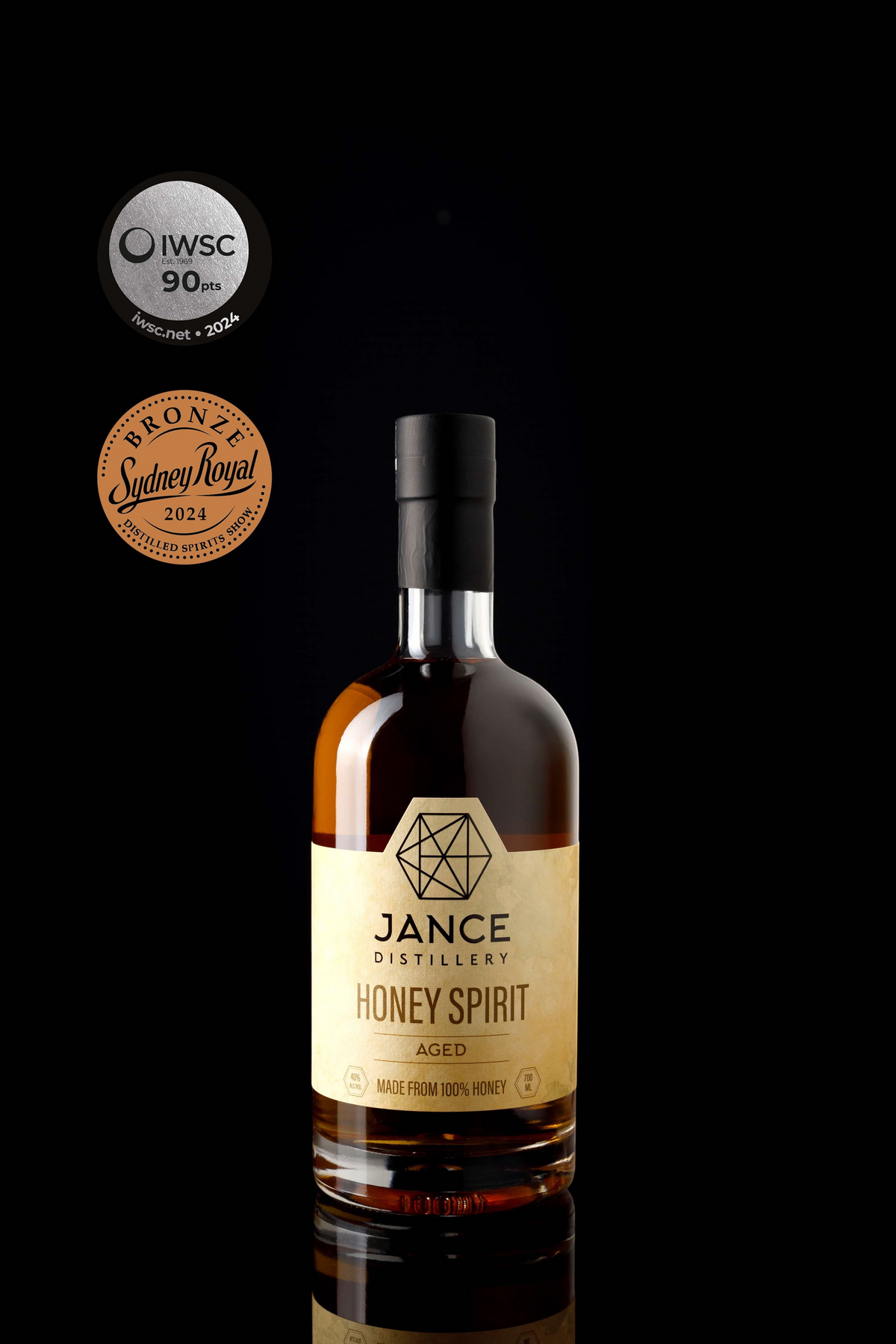 Coupla Jance Distillery Aged Honey Spirit in a glass bottle with a cream label, aged in French oak and PX casks.